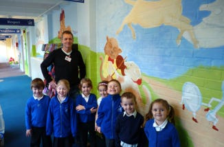 The children and mural at Kings Road School, Chelmsford, Essex